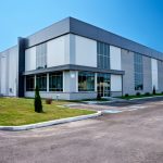 Modern,Industrial,Warehouse,With,Large,Windows,,Clean,Landscaping,,And,Loading