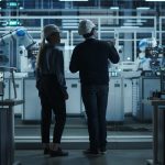 Female,And,Male,Industrial,Engineers,Having,A,Conversation,At,A